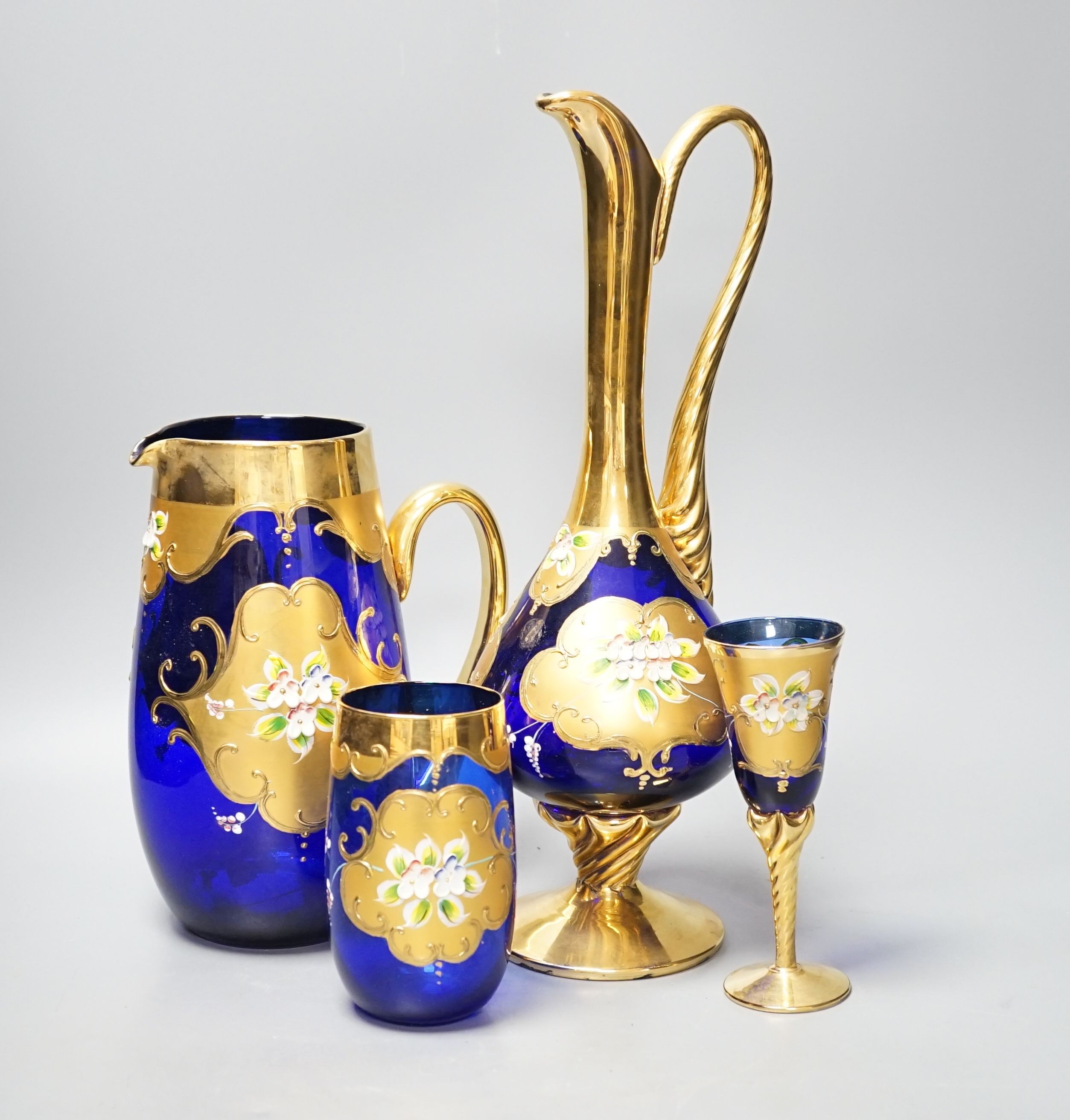 A collection of Venetian coloured and gilded glassware